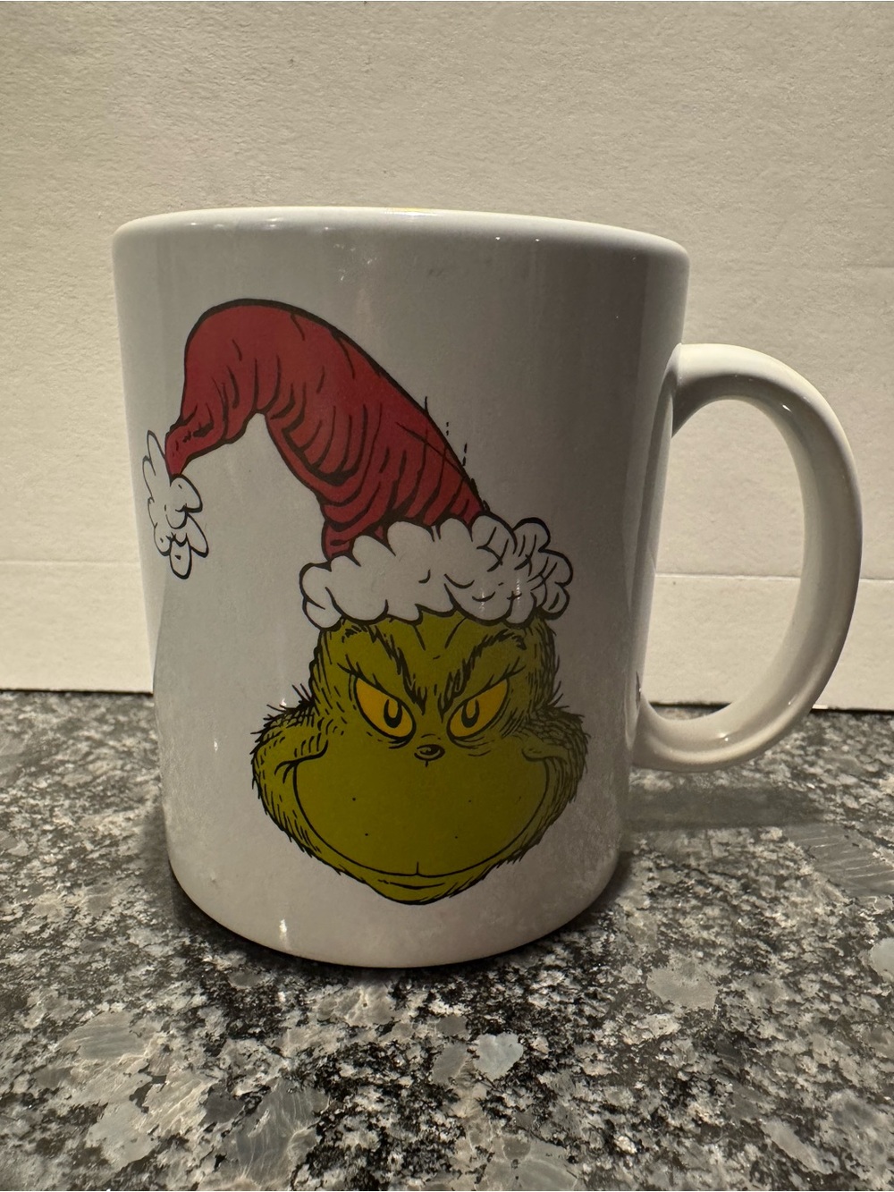 White Grinch Holiday Ceramic Mug with Red Santa Hat